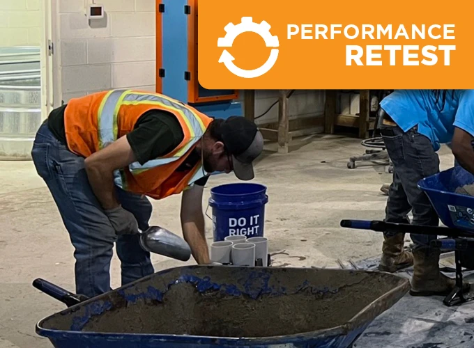 Concrete certification candidate performing a hands-on performance retest during an ACI Carolinas certification session.