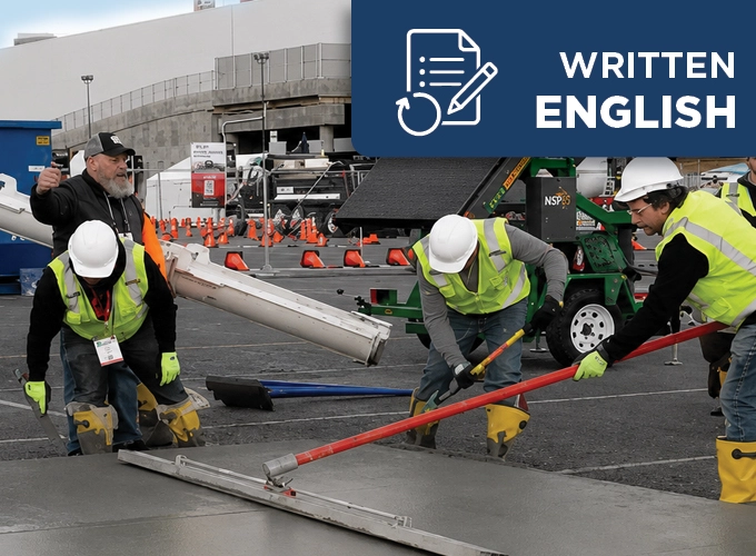 Concrete flatwork crew placing and finishing a concrete slab during a hands-on construction training session.