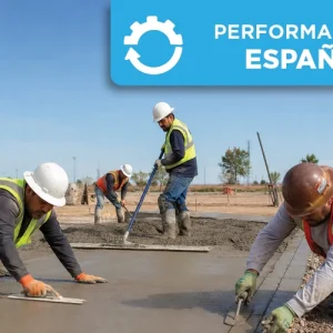 Latino concrete flatwork finisher smoothing freshly placed concrete during a performance exam.