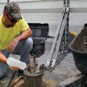 Concrete testing technician performing an air content test during Field Grade 1 NCDOT concrete training.